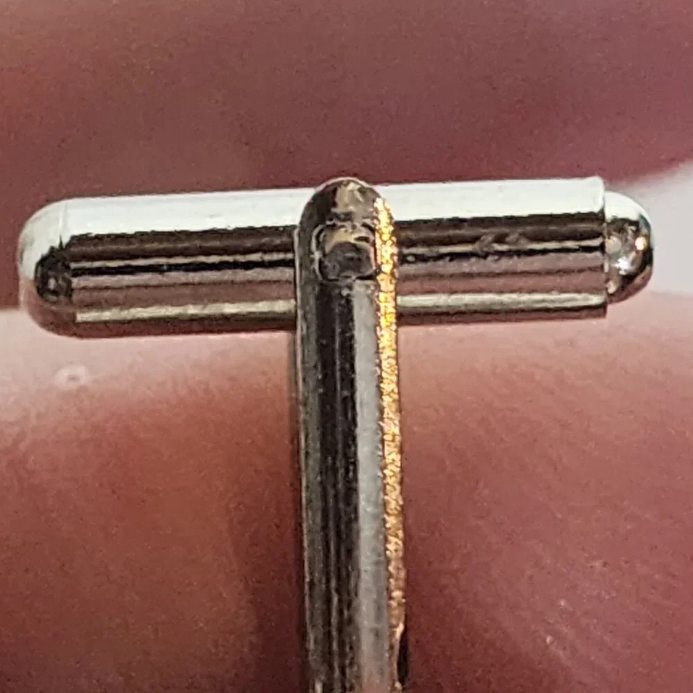 Source Unknown minimalist silver